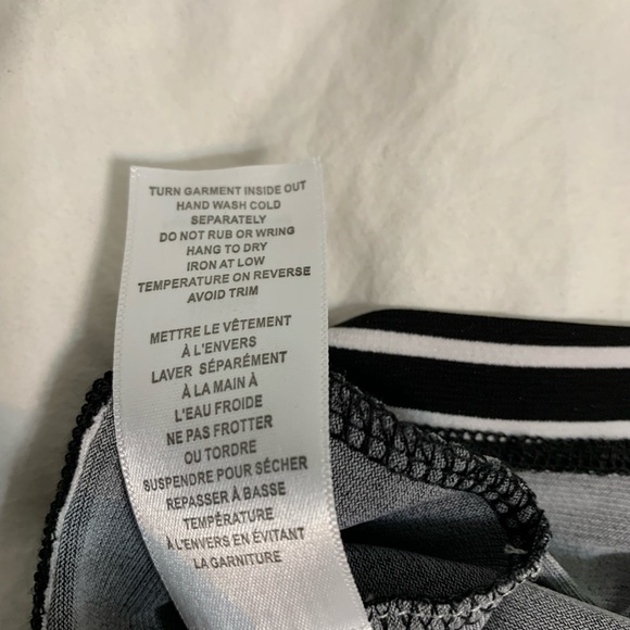 Silver buckle cinches at waist. Sleeveless black & White striped tunic in medium - Picture 8 of 8